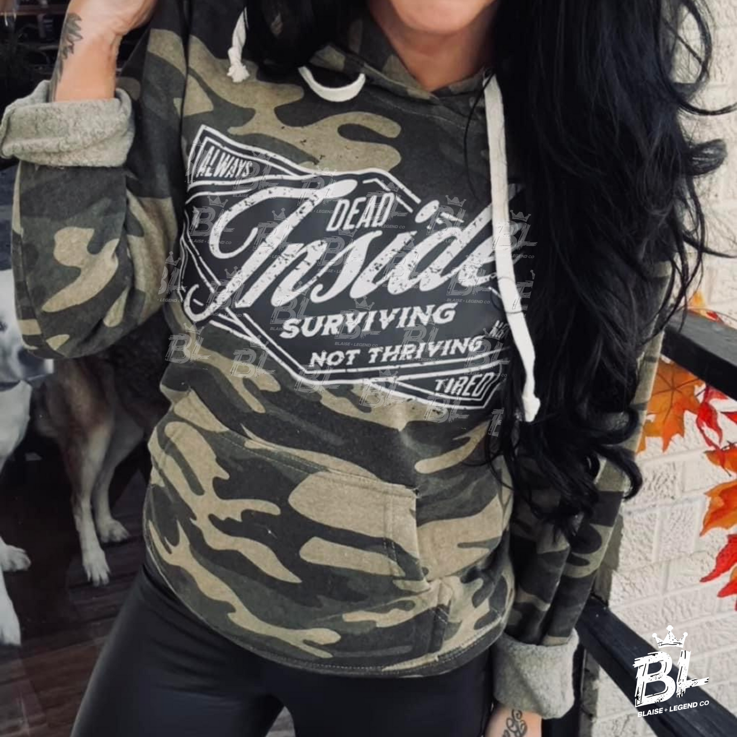 Comfortable camo hoodie with rebellious slogan for dark and edgy fashion lovers.