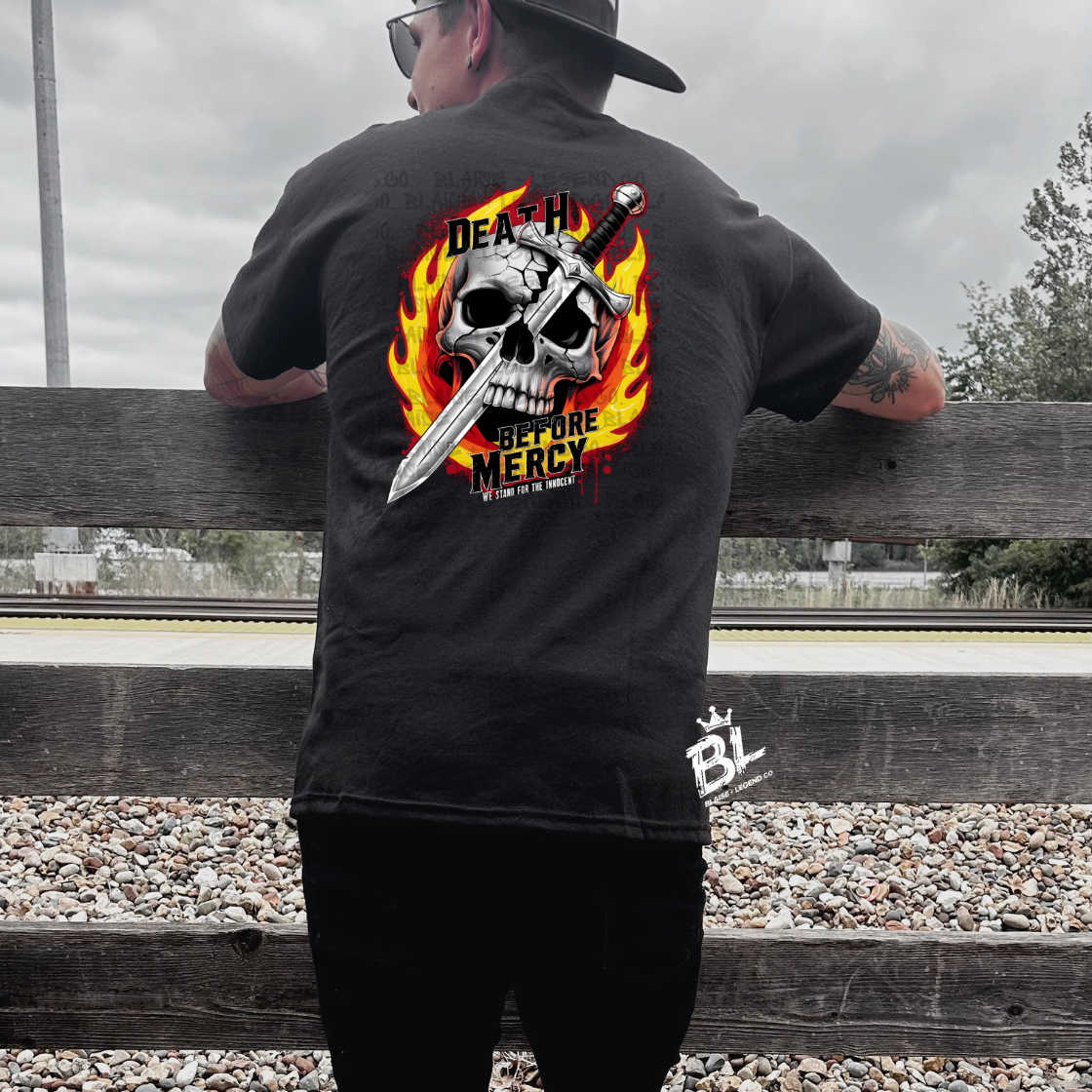 Death Before Mercy Short Sleeve Shirt featuring a skull, sword, and fiery flames graphic