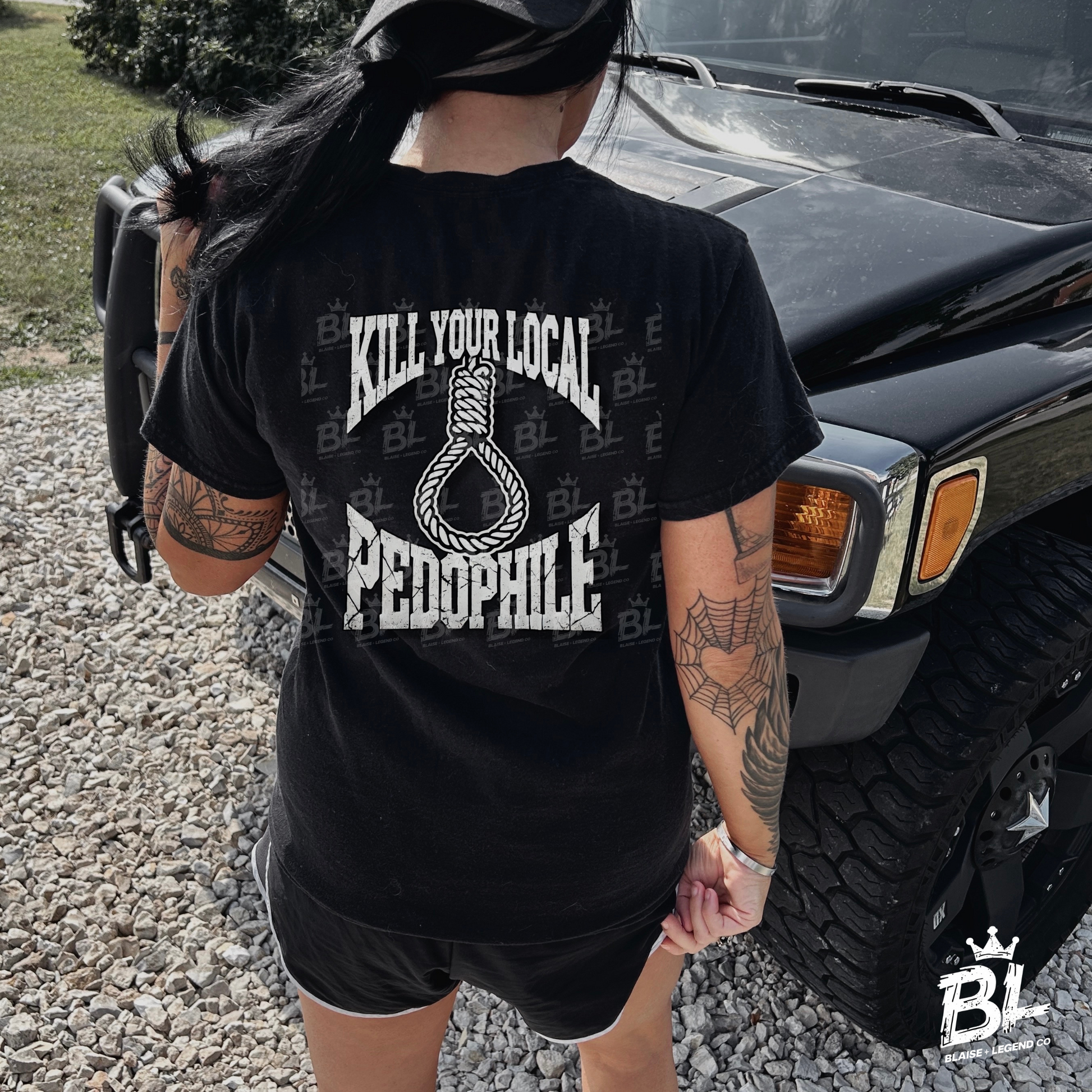 Black t-shirt with bold statement 'Kill Your Local Pedophile' in edgy font