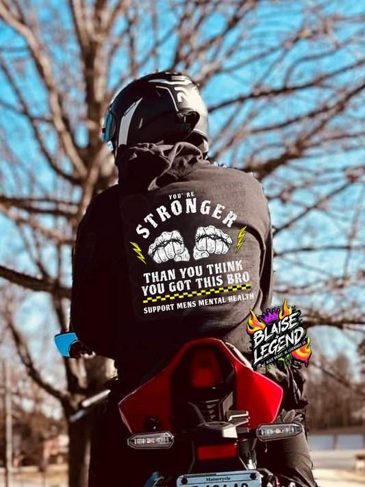 Hoodie with "You're Stronger Than You Think" design promoting men's mental health, available in black, army green, saddle, and red.